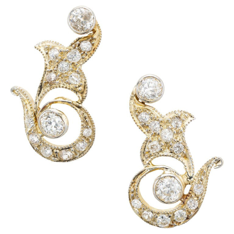 1.00 Carat Diamond Yellow Gold Swirl Earrings