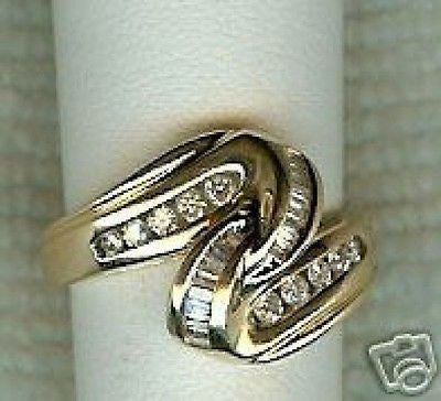 Estate 1970s 14k Yellow Gold Swirl Channel Set Round & Baguette Diamond Ring