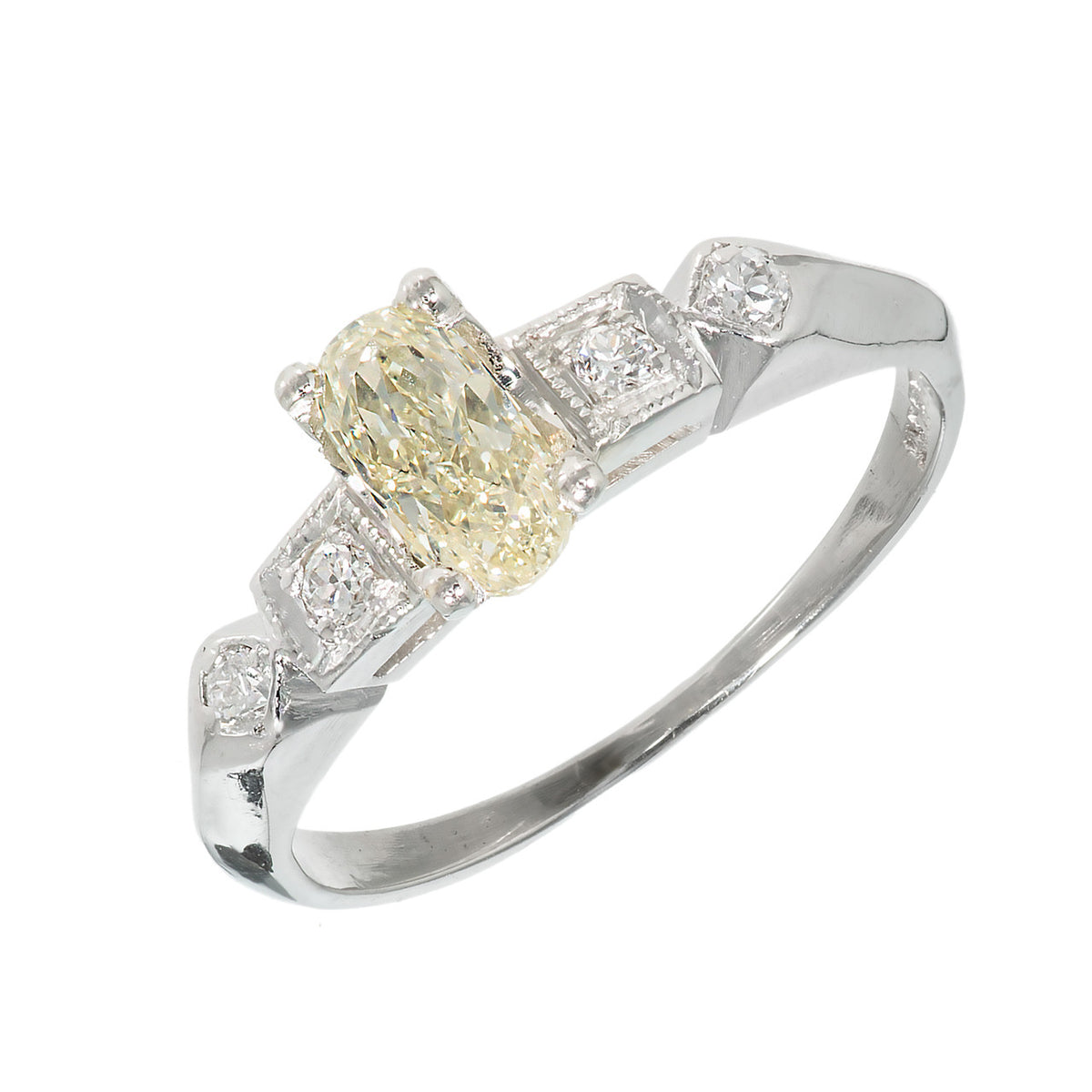 GIA Certified .57 Carat Oval Light Yellow Diamond Platinum Engagement Ring