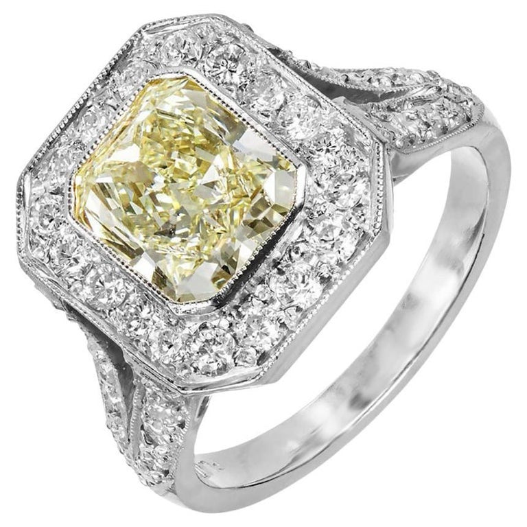 Peter Suchy EGL 2.06 Carat Fancy Yellow Diamond Halo Platinum Engagement Ring