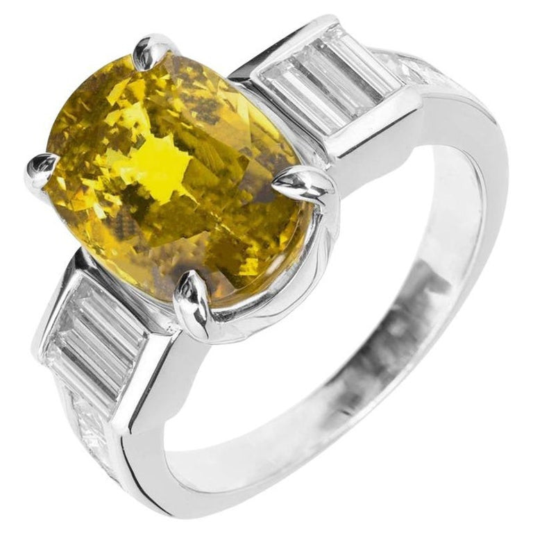 GIA 6.08 Carat Natural Oval Yellow Sapphire Diamond Platinum Engagement Ring