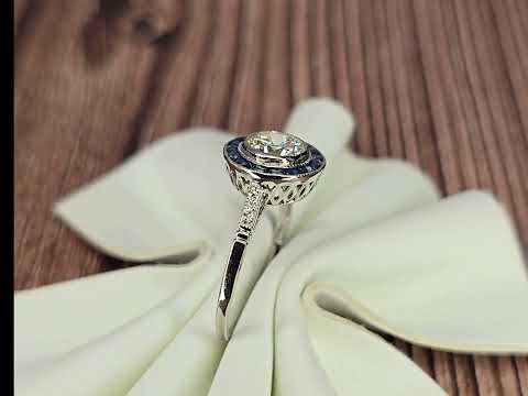 Diamond sapphire halo engagement ring